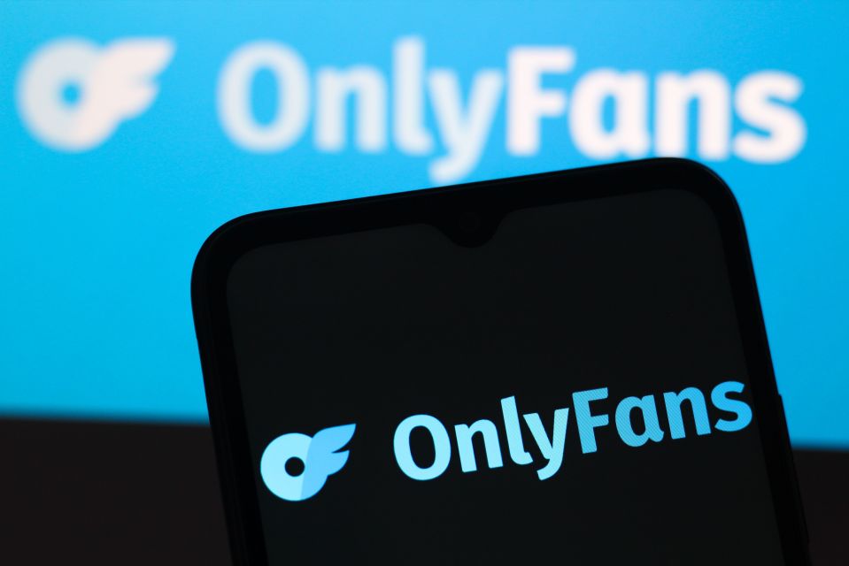 Illustration of the OnlyFans logo on a smartphone screen.