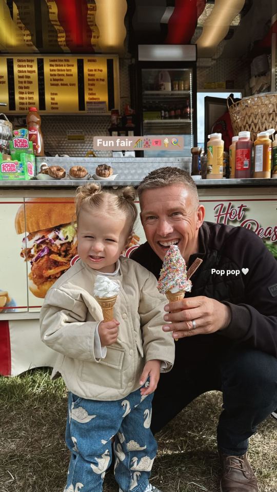 Molly-Mae Hague and her daughter enjoy ice cream at a funfair.