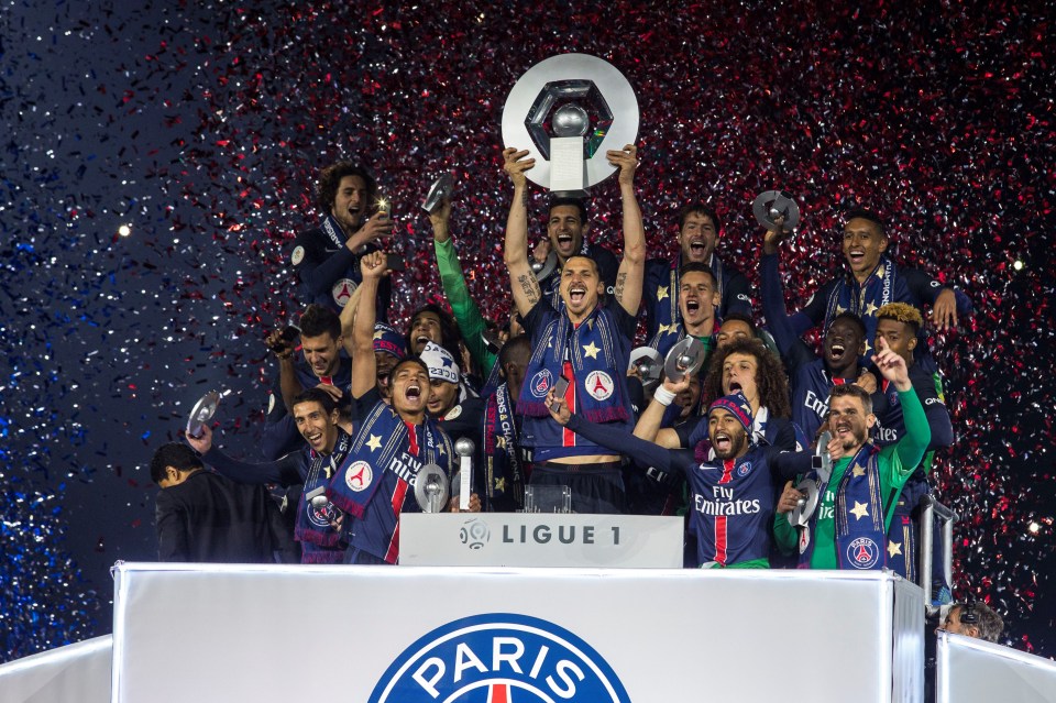 Paris Saint-Germain soccer team celebrating Ligue 1 victory.