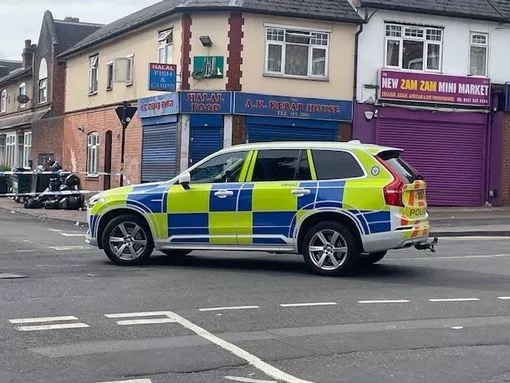 Police car at a crime scene.