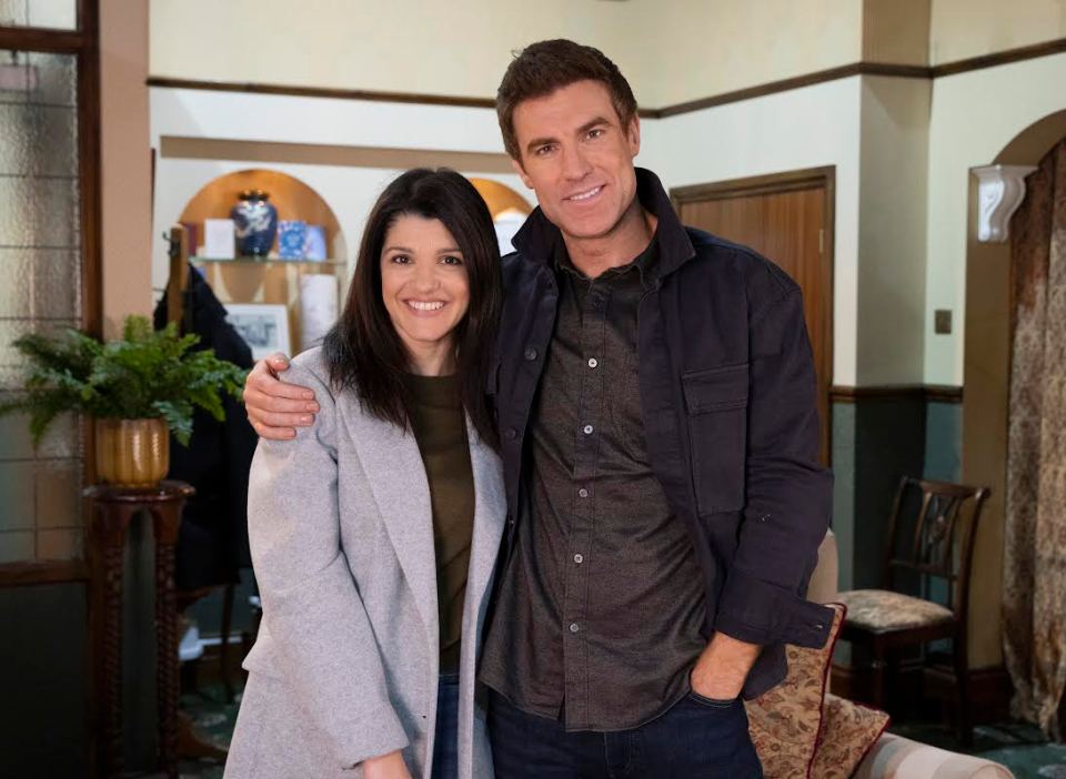Photo of Natalie Anderson and James Cartwright on the set of Coronation Street.