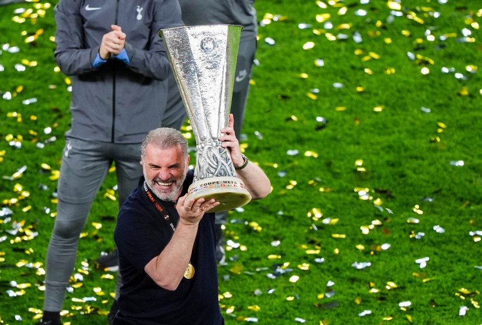 Ange Postecoglou, Tottenham Hotspur manager, lifts the Europa League trophy.