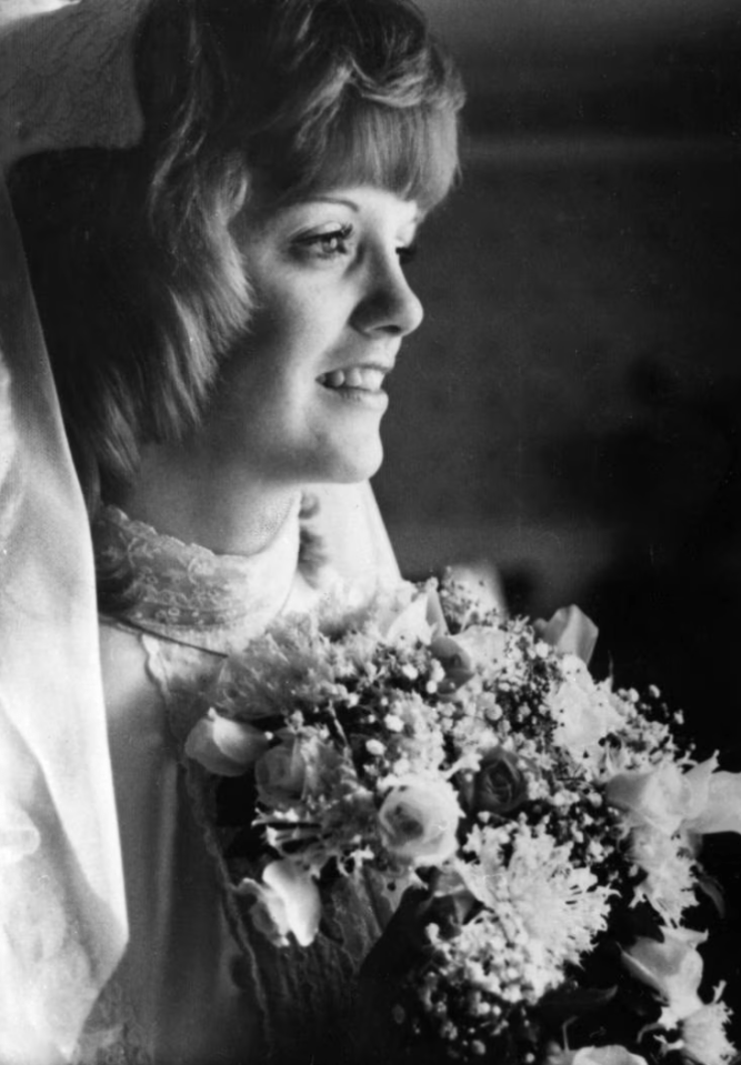 Black and white photo of Mary McFarland in a wedding dress.