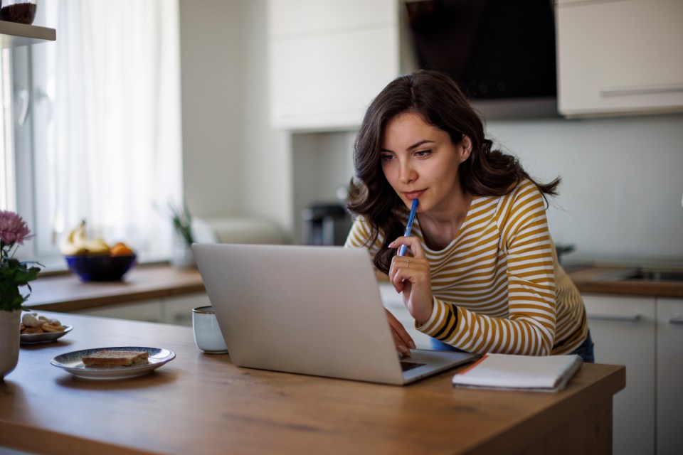 Woman working from home on her laptop.
